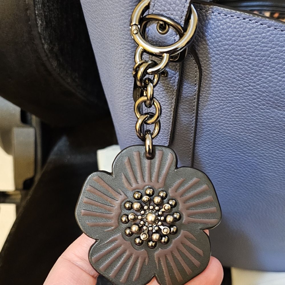 COACH tea rose bag charm like new